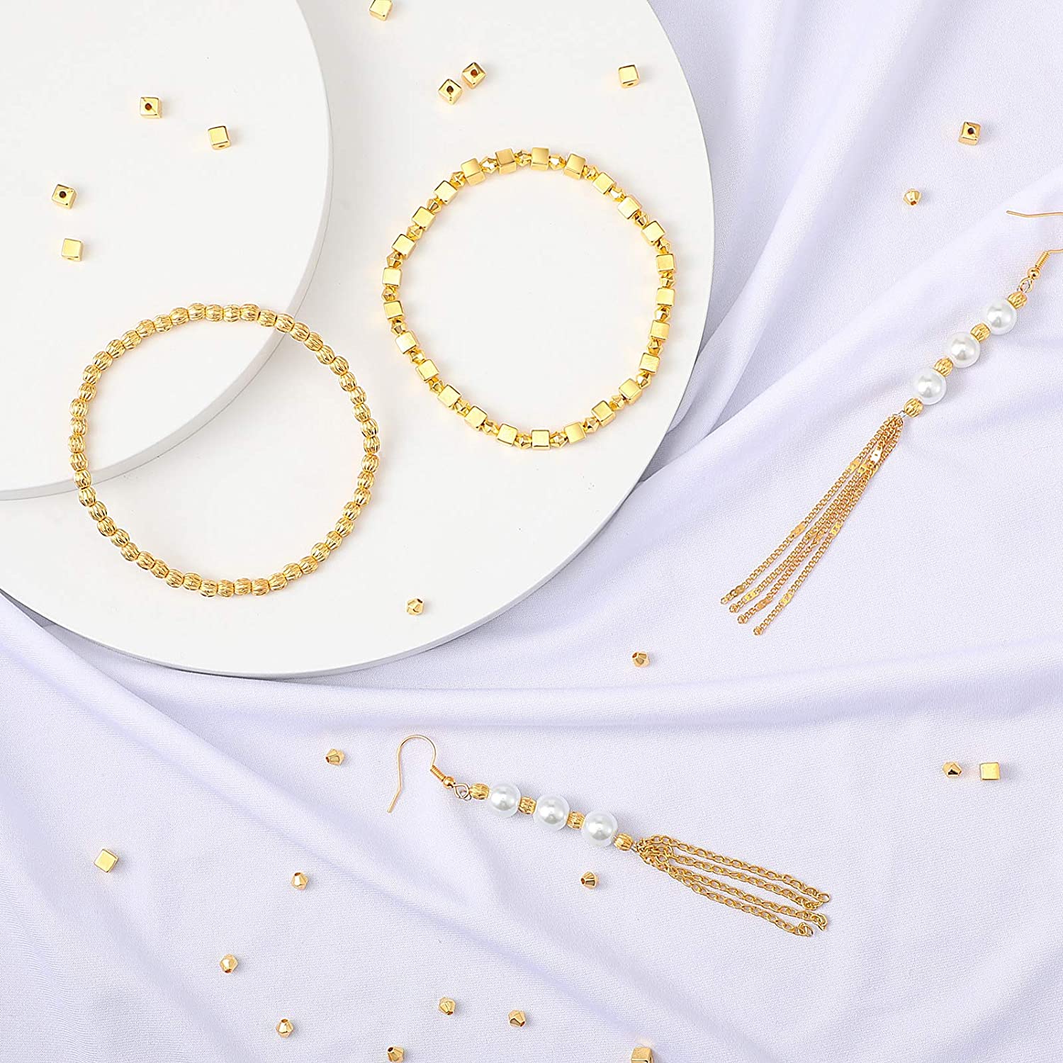 3000 Pieces Assorted Gold Spacer Beads Set Include 500 Loose Round Beads, 500 Watermelon Beads 500 Cube Beads 500 Faceted Rondelle Beads 500 Flat Flower Beads and 500 Flat Disc Beads for DIY Bracelet image 3